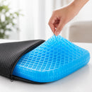 Detalhe da VittaGel Comfort mostrando a estrutura flexível em gel colmeia azul e a capa protetora removível com zíper.